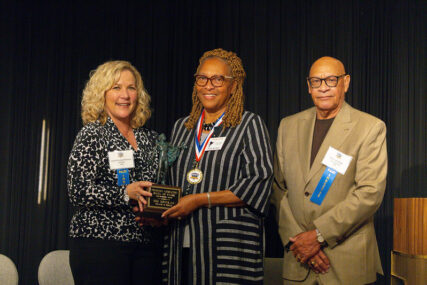 Ivy Charlie and Gena smiling at the camera