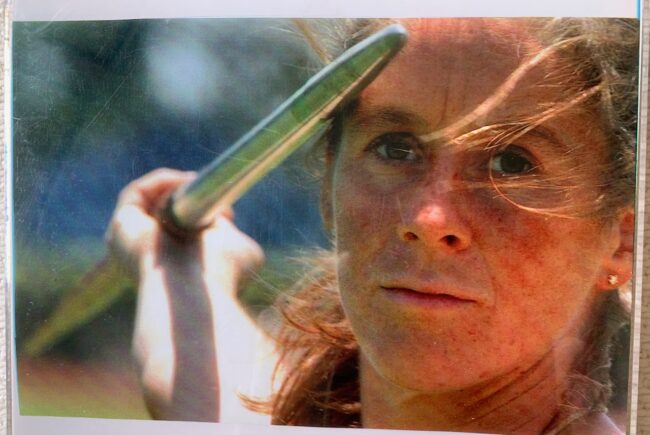 Nicole Carroll close up with a javelin in her hand with deep focus