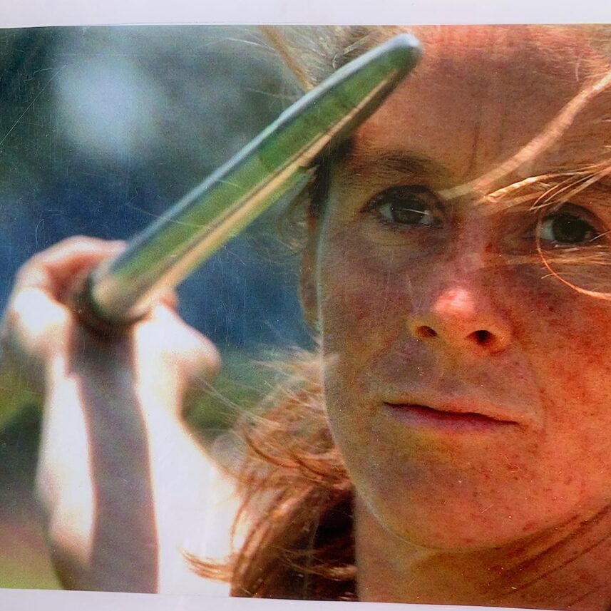 Nicole Carroll close up with a javelin in her hand with deep focus